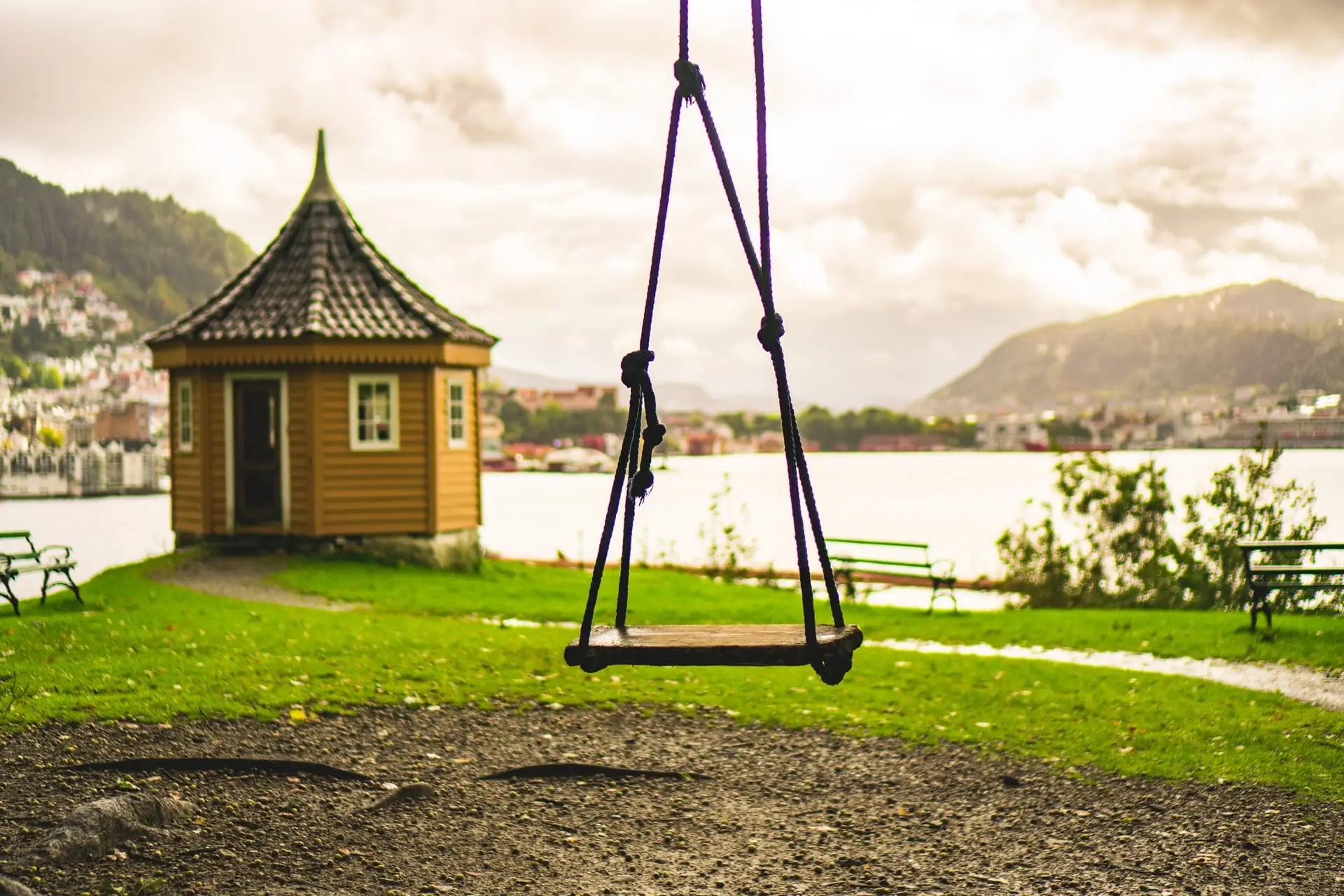 swing in front of city