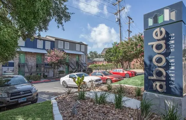 exterior photo of The Abode apartments